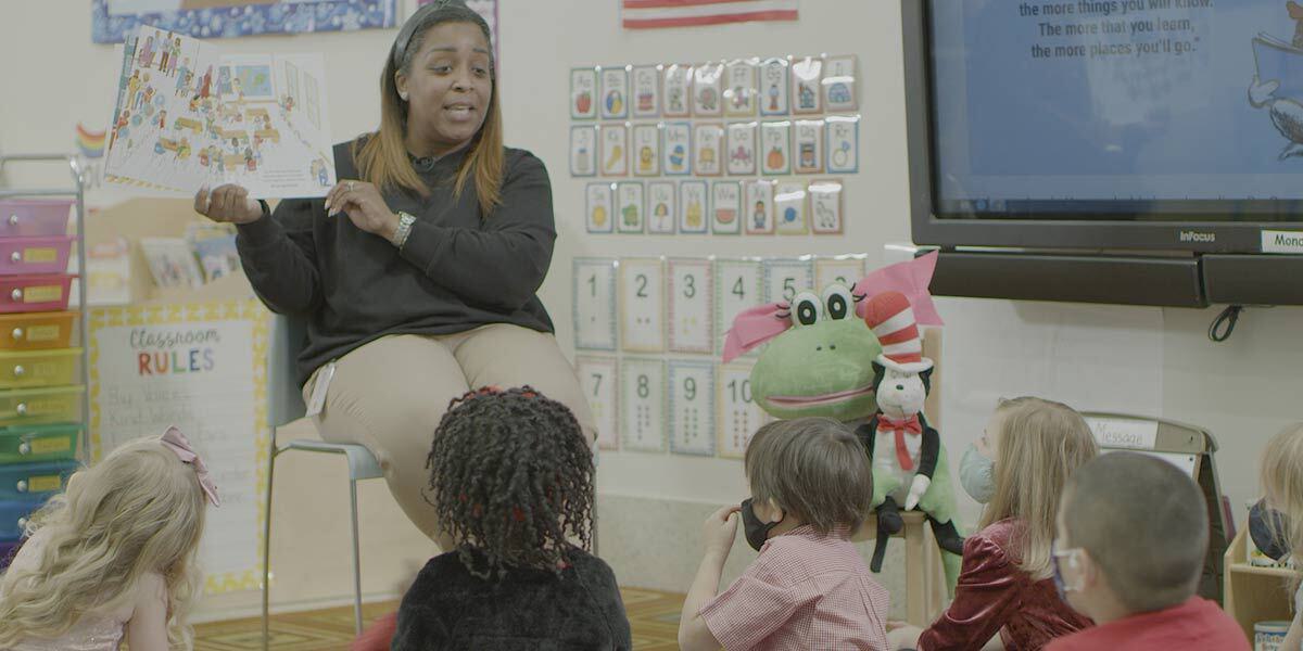 Jennifer Forrest Early Childhood Educator Reading Book to Children