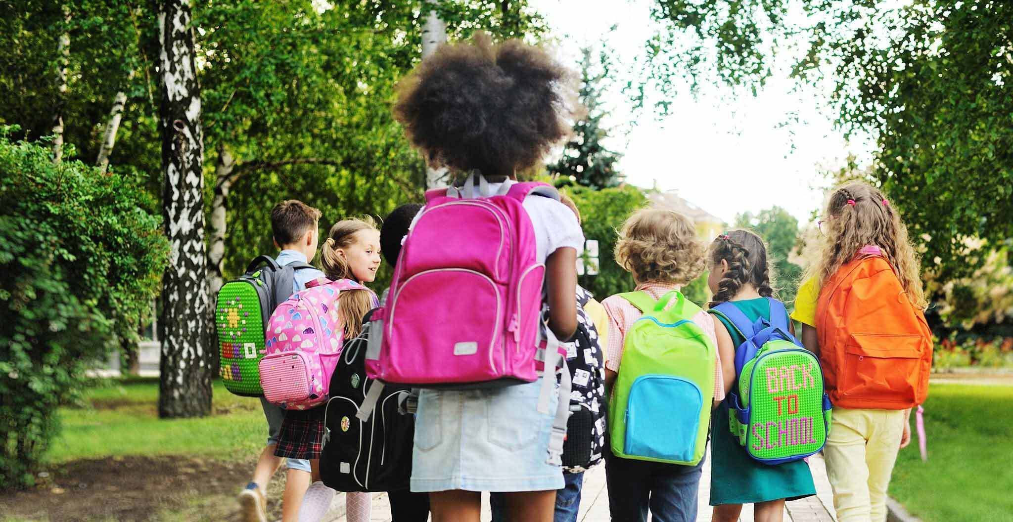 Chlidren Walking to School with Backpacks